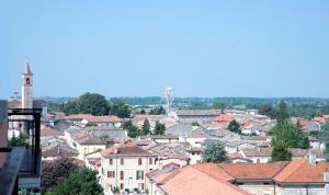 a view of a city with houses and roofs at Piano8 in Asola