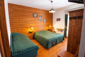 Кровать или кровати в номере Da Nonna Li Rooms and Breakfast