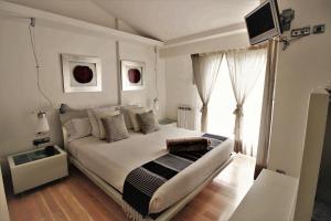 Posteľ alebo postele v izbe v ubytovaní Bonita villa pareada con piscina privada + 24 fotografií