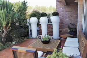 Vonkajšia záhrada v ubytovaní Bonita villa pareada con piscina privada