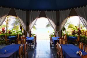 a dining room with blue tables and chairs at Suite Rivas 126 Gran Pacifica Resort in San Diego