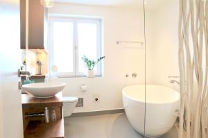 Baðherbergi á Boutique Hotel Reschen