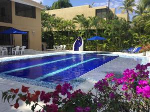 Bazén v ubytování HERMOSA CASAQUINTA FAMILIAR CONDOMINIO CAMPESTRE EL PEÑON Piscina Privada Campo de Golf nebo v jeho okolí