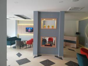 TV a/nebo společenská místnost v ubytování Atva Residence Hotel