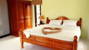 Postel nebo postele na pokoji v ubytování LANTA LUCKY HOUSE
