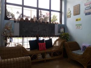 Area soggiorno di Mayon Lodging House
