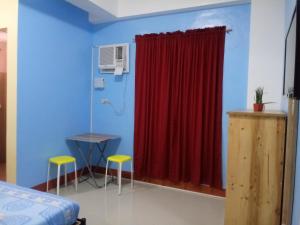 Letto o letti in una camera di Mayon Lodging House