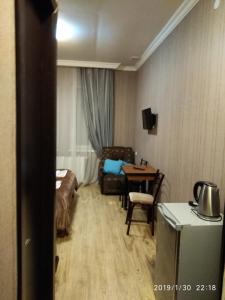Χώρος καθιστικού στο Alma-Ata Hotel