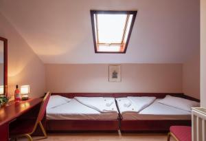 Postel nebo postele na pokoji v ubytování B&B Garestin