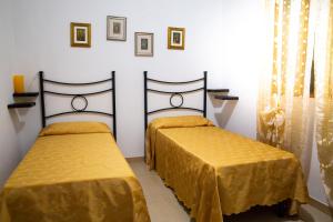 
Een bed of bedden in een kamer bij Agriturismo I Vigneti
