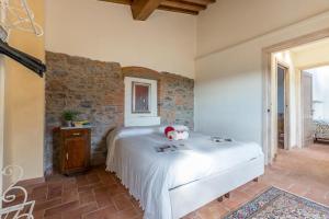 Posteľ alebo postele v izbe v ubytovaní Relais del Lago e Relais del Monte