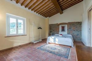Posteľ alebo postele v izbe v ubytovaní Relais del Lago e Relais del Monte