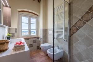 Kúpeľňa v ubytovaní Relais del Lago e Relais del Monte