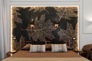 A bed or beds in a room at Cavour Suites Guest House Még 37 kép