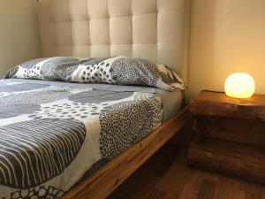 Postel nebo postele na pokoji v ubytování Vidrio Apartment
