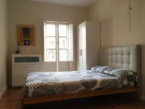 Postel nebo postele na pokoji v ubytování Vidrio Apartment