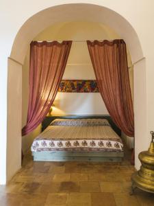 Postelja oz. postelje v sobi nastanitve Dammuso Sant'Anna