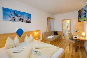 Telewizja i/lub zestaw kina domowego w obiekcie Aparthotel Alpendiamant Serfaus Wachter GmbH