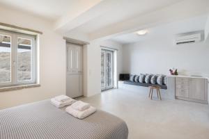 Posteľ alebo postele v izbe v ubytovaní Xyla Beach Studios