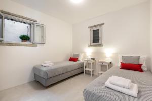 Posteľ alebo postele v izbe v ubytovaní Xyla Beach Studios