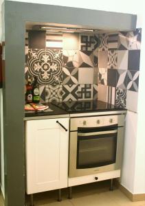 Cuisine ou kitchenette dans l'établissement Anjos Apartment - Ilha do Príncipe