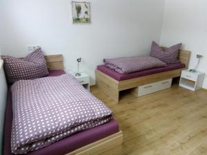 Barschtlerhof tesisinde bir odada yatak veya yataklar