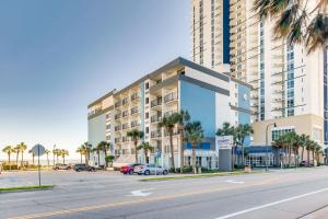 an empty street in front of a large building at Boardwalk Beach Resort Condo w Oceanfront Balcony in Myrtle Beach