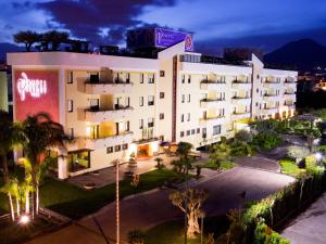 an aerial view of a hotel at night at Abalon Pompei Resort in Pompei