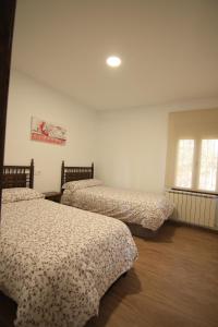 Katil atau katil-katil dalam bilik di EL MIRADOR DEL MOLINO