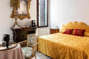 Postel nebo postele na pokoji v ubytování Luxury Venetian Rooms