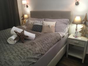 Ένα ή περισσότερα κρεβάτια σε δωμάτιο στο Chalet L'Escapade