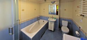 Kúpeľňa v ubytovaní Apartament przy Walowej + 16 fotografií