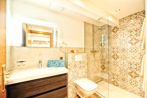 Koupelna v ubytování Appartements & Chalets Wiesenruh