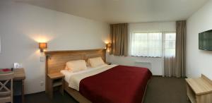Postel nebo postele na pokoji v ubytování Hotel Resort Stein + 37 fotografií