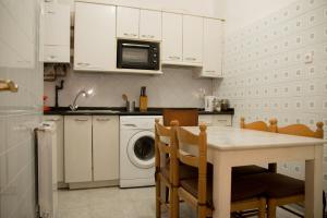 Kuchyň nebo kuchyňský kout v ubytování Beach Side Apartment + 6 fotografií