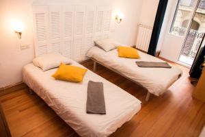 Postel nebo postele na pokoji v ubytování Beach Side Apartment