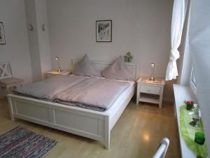 Postel nebo postele na pokoji v ubytování Pension Kölzer
