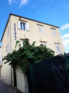 a building with a fence in front of it at Apartment Hladilo "Nostalgia" in Dubrovnik