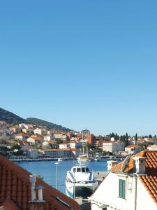 a view of a harbor with boats in the water at Apartment Hladilo "Nostalgia" in Dubrovnik