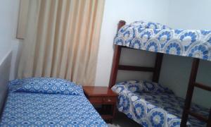 Postel nebo postele na pokoji v ubytování Hotel Real Pólux