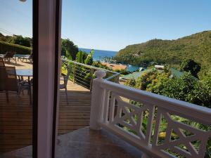 a view from the balcony of a house at Casa Vista in Marigot Bay