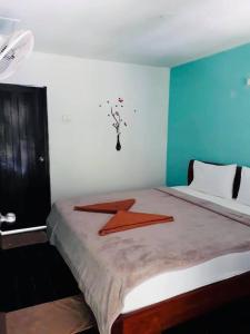 Postel nebo postele na pokoji v ubytování Grand Beach Resort