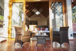 Posezení v ubytování The Birchwood Retreat, Madikeri