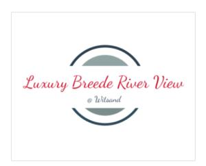 a logo for a luxury bicycle river view restaurant at Luxury Breede River View at Witsand- 300B Self-Catering Apartment in Witsand