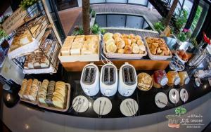 a display of various types of bread and pastries at K.B. Resort in Ko Chang