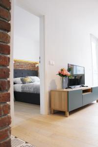 Posteľ alebo postele v izbe v ubytovaní Comfy with great city view by Cooee Apartments