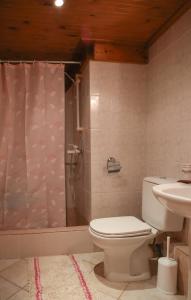 A bathroom at Under the Clock Tower (Greek Traditional 125m2 home)