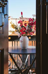 A balcony or terrace at Under the Clock Tower (Greek Traditional 125m2 home)