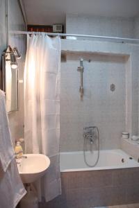 A bathroom at Under the Clock Tower (Greek Traditional 125m2 home)