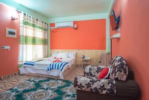 Letto o letti in una camera di Olhumathi View Inn